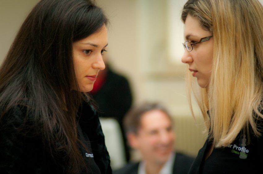 Alexandra and Almira discussing the strategy before the game