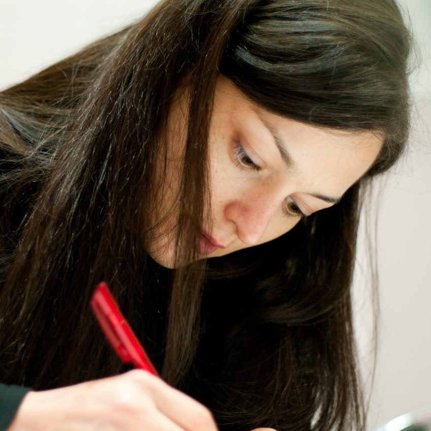 Alexandra is signing her new book "Diary of a Chess Queen"